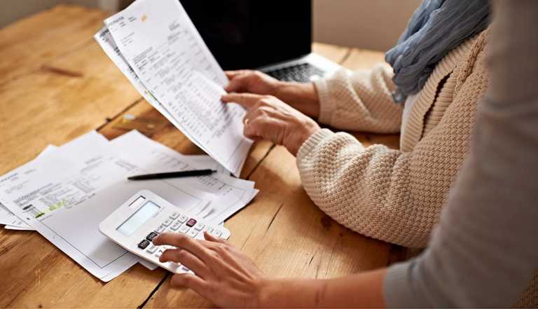 woman paying bills online 