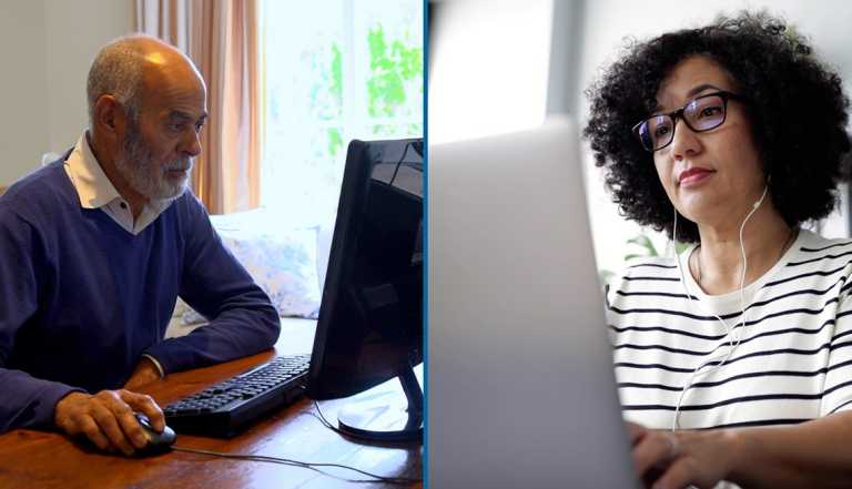 two people working on a computer