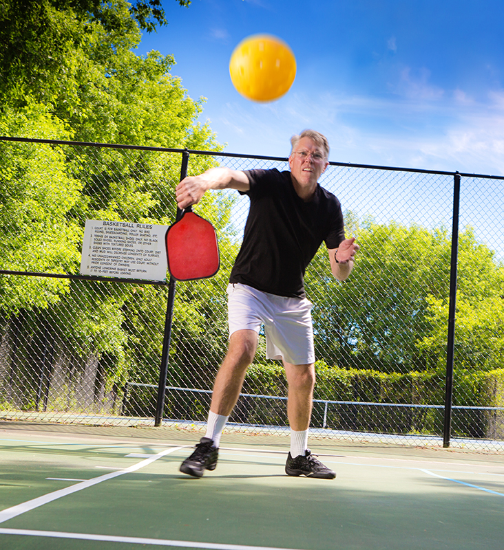 man playing pickleball