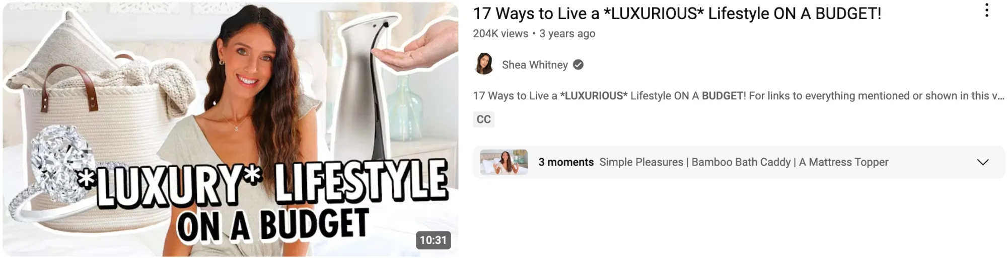 A smiling woman with luxury items like a diamond ring for a video titled “17 Ways to Live a Luxurious Lifestyle on a Budget.”